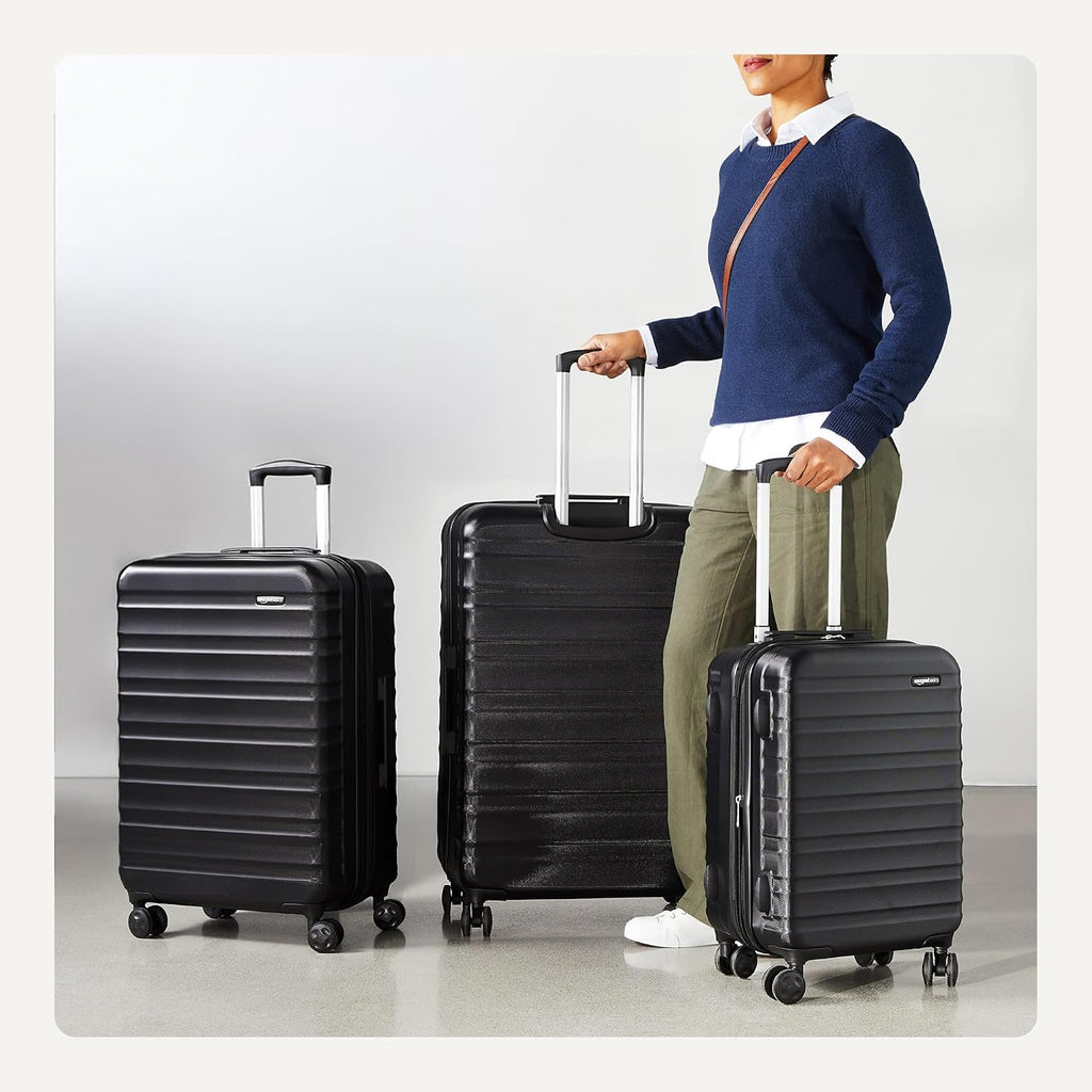 Amazon Basics 3-Piece Hardshell Luggage Set (21', 26', 30'), Scratch-Resistant Expandable Suitcases with Multi-directional Wheels and Telescoping Handle, Black