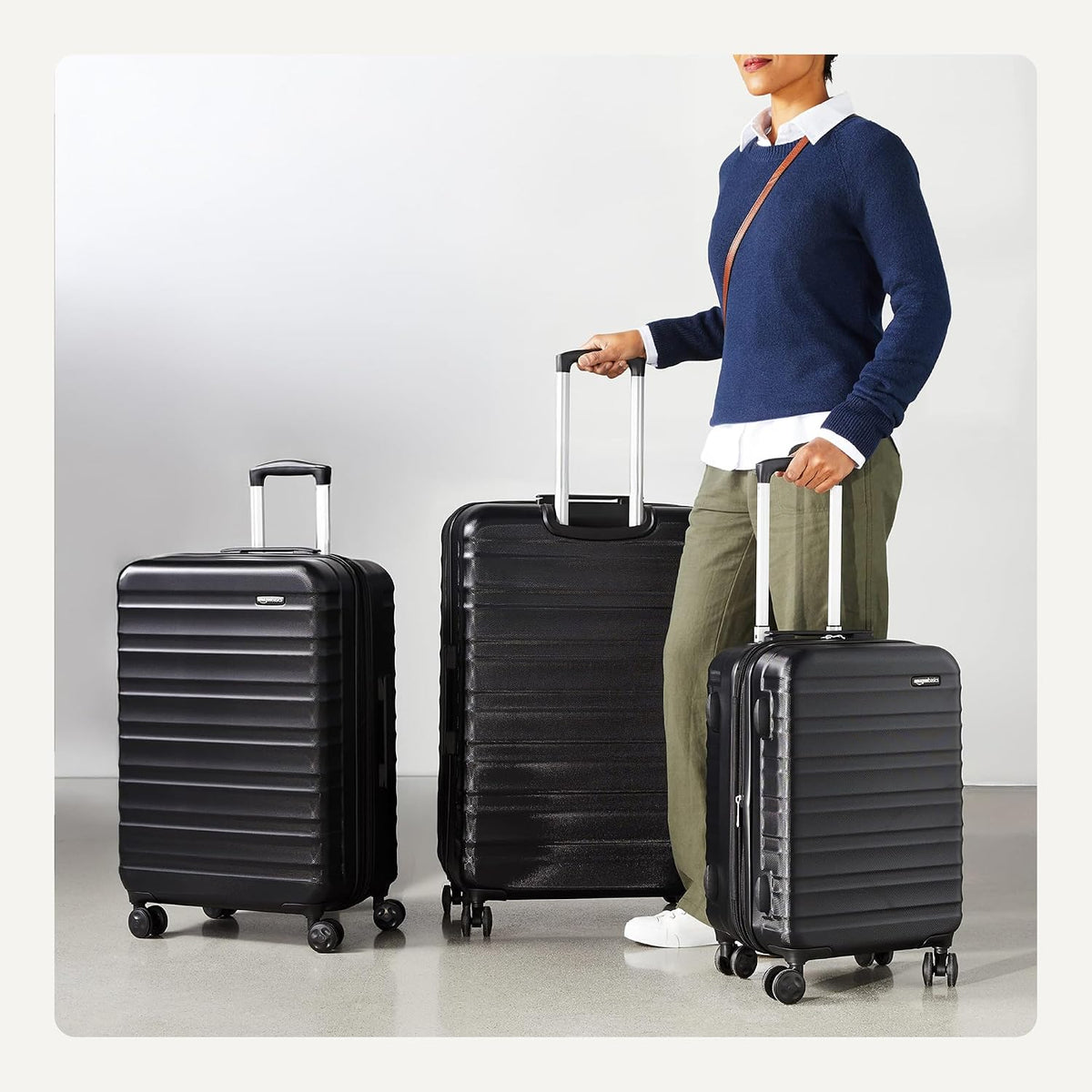 Amazon Basics 3-Piece Hardshell Luggage Set (21', 26', 30'), Scratch-Resistant Expandable Suitcases with Multi-directional Wheels and Telescoping Handle, Black