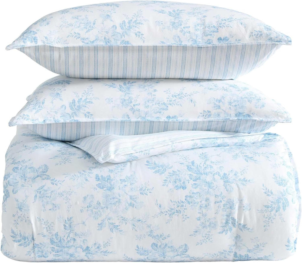 Laura Ashley - Queen Bonus Comforter Set, Soft Reversible Bedding Set, 7 Piece Bed Set with Matching Pillowcases, Euro Shams, & Throw Pillow Covers (Annalise Floral/Dilly Dally Stripe Blue)