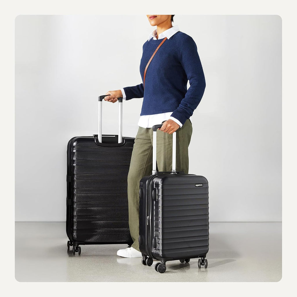 Amazon Basics 2-Piece Hardside Luggage Set (21' Carry-on, 30'), Expandable Suitcases with Spinner Wheels, Scratch-Resistant Surface, Black