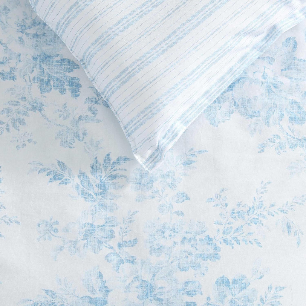 Laura Ashley - Queen Bonus Comforter Set, Soft Reversible Bedding Set, 7 Piece Bed Set with Matching Pillowcases, Euro Shams, & Throw Pillow Covers (Annalise Floral/Dilly Dally Stripe Blue)