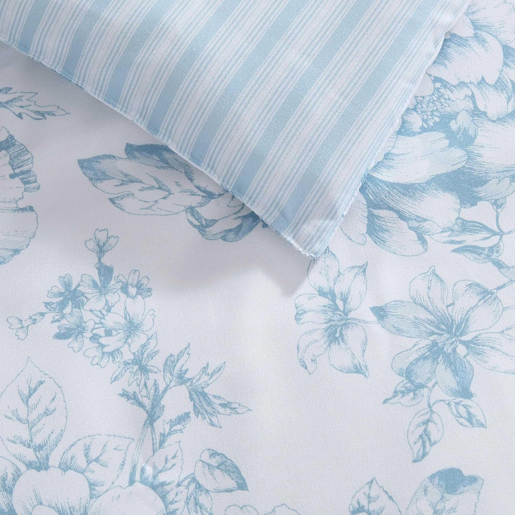 Laura Ashley - Queen Comforter Set, Soft & Reversible Floral Bedding with Bonus Bed Sheets & Pillowcases, 7 Piece Bed Set for Year Round Comfort (Delphine Saras/Sprig Blue)