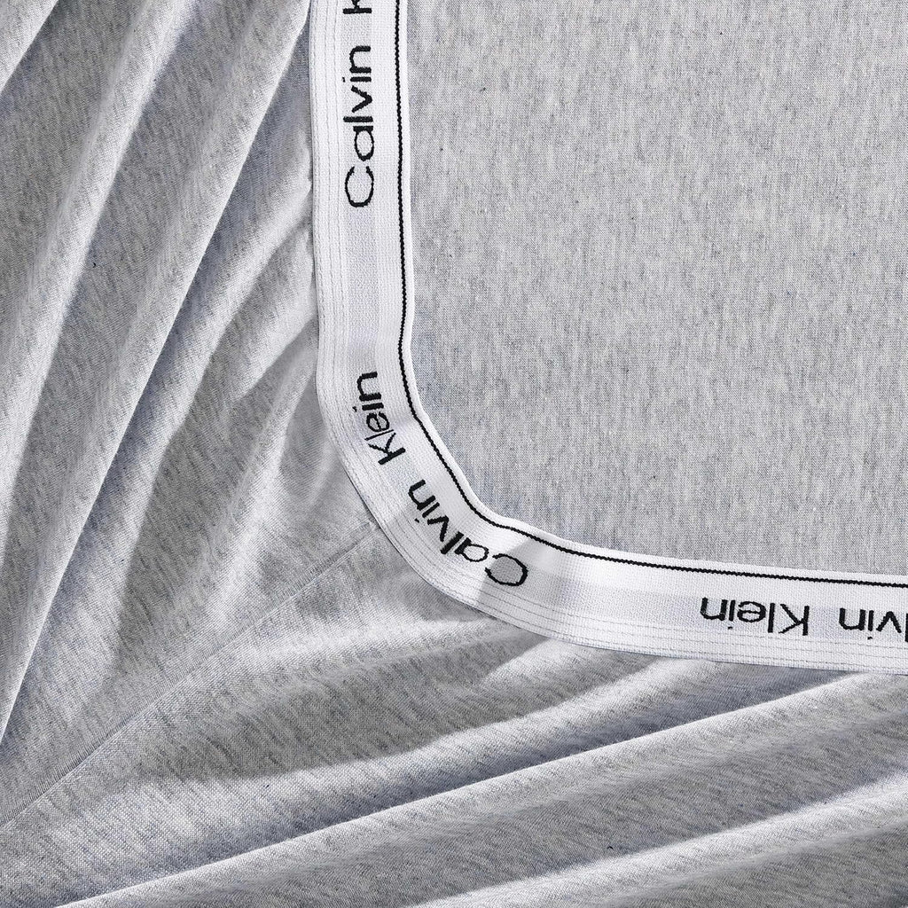 Calvin Klein - King Size Sheets Set, Naturally Soft Cotton-Blend Melange Jersey Bedding - Bed Sheets with Matching Pillowcases & Fitted Sheet (Modern Cotton Grey/Blue)